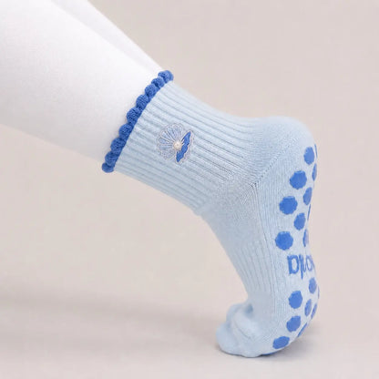 The Pearl Embellished Embroidery Grip Sock with Blue Shell-Inspired Grips for Pilates, Barre, Lagree, and Yoga